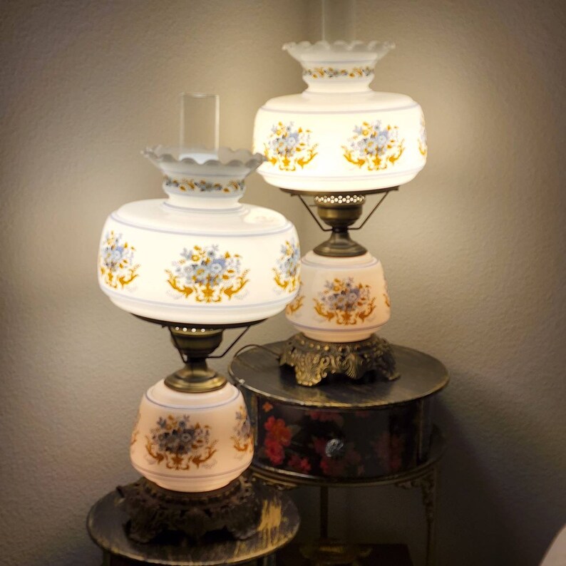 Romantic pair of vintage parlor lamps, Quoizel milk glass,mid century vintage, hand painted Hurricane table lamps, bronze bass