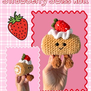 May include: A crocheted tan Swiss roll cake plushie with a white cream swirl, a red strawberry topper, and two small dangling legs. The plushie features a stitched black smile and two black bead eyes. The text Strawberry Swiss Roll is visible.