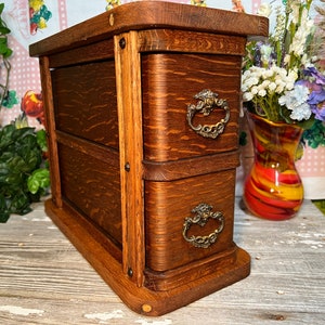 Creative Craft Paint Storage using vintage sewing machine drawers