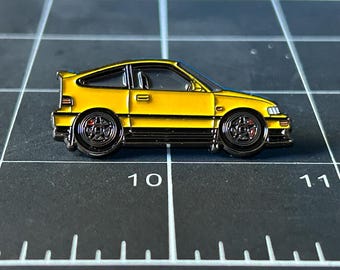 CRX 'Barbados-geel' autospeld | Zachte emaille pin | Reversspeld