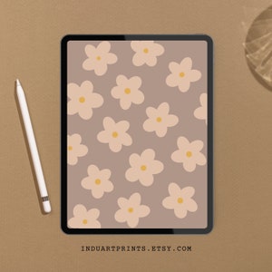 May include: A digital tablet displaying a pattern of beige flowers with yellow centers on a light brown background. The text "INDUARTPRINTS.ETSY.COM" is at the bottom of the screen.