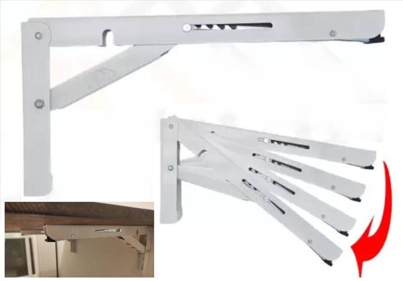 K&ouml;nnte beinhalten: Wei&szlig;er, zusammenklappbarer, an der Wand montierter W&auml;schest&auml;nder. Der St&auml;nder besteht aus Metall und hat eine Reihe von Klapparmen. Er ist f&uuml;r die Wandmontage konzipiert und kann bei Nichtgebrauch zusammengeklappt werden. Der St&auml;nder wird in ge&ouml;ffneter und geschlossener Position gezeigt.