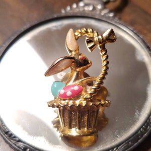 Vintage Easter pin.. Gold-tone Bunny with Basket and Enamel Easter Eggs