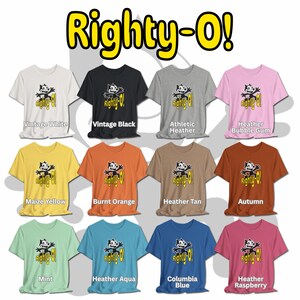 May include: A set of ten t-shirts featuring a cartoon cat with the text "Righty-O!" in yellow. The t-shirts are shown in various colors, including vintage white, vintage black, athletic heather, heather bubble gum, maize yellow, burnt orange, heather tan, autumn, mint, heather aqua, columbia blue, and heather raspberry.