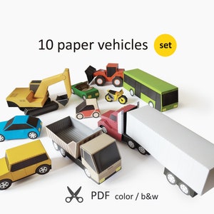 Giocattoli di carta di automobili, moto, autobus, camion e attrezzature. Album per lavoretti con la carta
