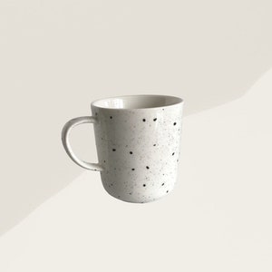 handmade black speckled design white earthenware mug / cup image 1