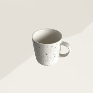 handmade black speckled design white earthenware mug / cup image 4