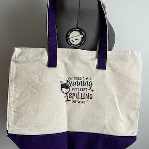 Embroidered zippered canvas tote