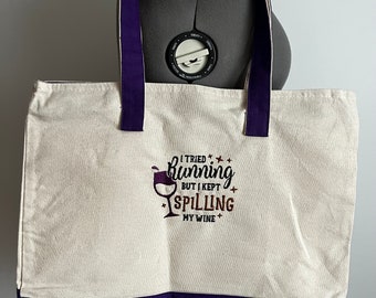 Embroidered zippered canvas tote