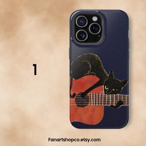 May include: Navy blue phone case featuring a black cat playing a red guitar. The cat has yellow eyes and is positioned on the guitar's body. The text "Fanartshopco.etsy.com" is at the bottom.
