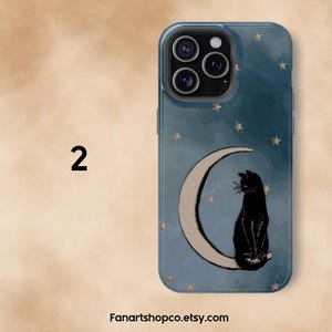 May include: A phone case with a dark teal background featuring a black cat sitting on a crescent moon. Gold stars are scattered across the case. The number "2" is in the upper left corner, and the Etsy shop name is at the bottom.