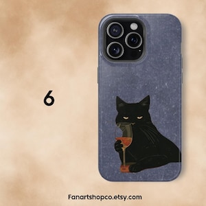May include: A phone case with a black cat illustration holding a glass of red wine. The cat has yellow eyes and is set against a textured blue background. The number 6 is in the upper left corner, and the Etsy shop name is at the bottom.