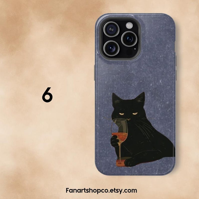 May include: A phone case with a black cat illustration holding a glass of red wine. The cat has yellow eyes and is set against a textured blue background. The number 6 is in the upper left corner, and the Etsy shop name is at the bottom.