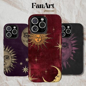 May include: Three phone cases featuring celestial designs. The left case is dark purple with a sun and moon. The center case is deep red with a sun, moon, and stars. The right case is black with a sun and moon. Each case has a triple camera cutout.