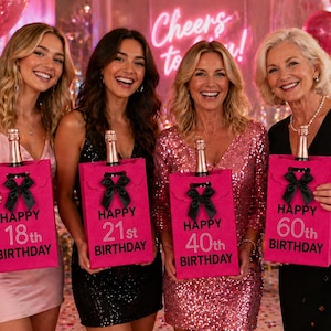 May include: Four women holding pink gift bags with champagne bottles. Each bag has a black bow and the words "Happy Birthday" with different ages: 18th, 21st, 40th, and 60th. The background includes balloons and a neon sign.
