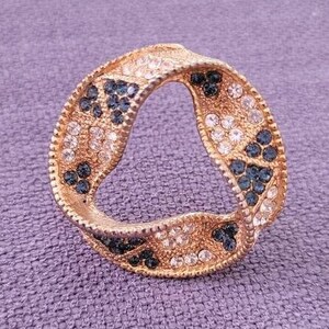 Vintage eternal circle brooch gold tone rhinestones, penannular brooch