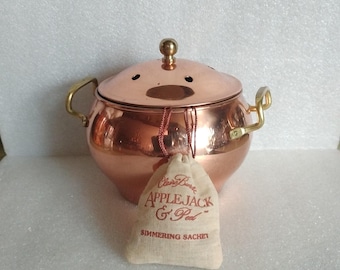 Vintage copper potpourri pot with vented lid, brass handles and simmering sachet