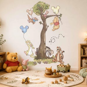 May include: A wall decal featuring Winnie the Pooh characters including Piglet, Tigger, Eeyore, Rabbit, and Roo gathered around a large tree. The characters are depicted in a classic illustration style with soft colours and Mickey Mouse balloons.