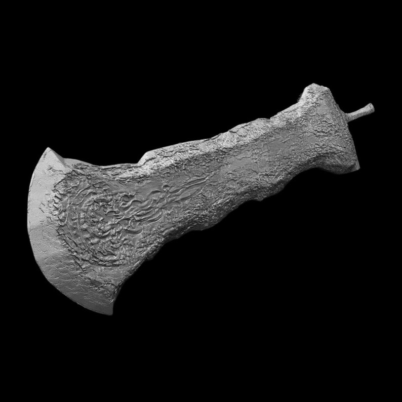 May include: A silver axe with a textured surface and a sharp blade. The axe has a long handle with a textured surface.