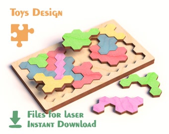 May include: A wooden puzzle with a honeycomb design. The puzzle pieces are in various colours, including green, blue, pink, and yellow. The puzzle is made of wood and has a natural finish. The puzzle is designed for laser cutting and is available for instant download. The text "Toys Design" is visible at the top of the image.
