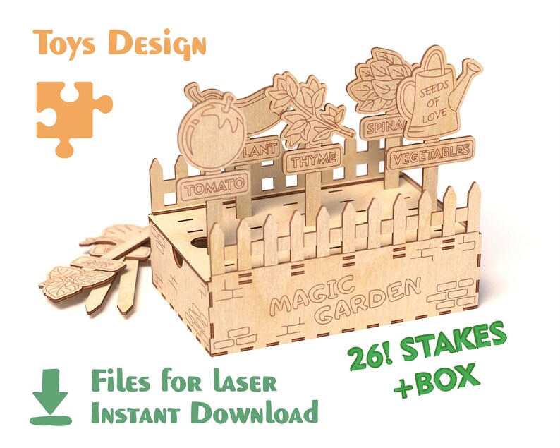 May include: A wooden laser-cut toy garden set with a picket fence design. The set includes plant markers labeled "Tomato", "Thyme", "Spinach", and "Vegetables". The text "Magic Garden" is on the box. The image also includes the text "26! STAKES + BOX".