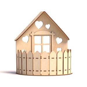May include: A wooden house with a fence and heart cutouts. The house has a window with four panes. The house is light brown and the fence is a darker brown.