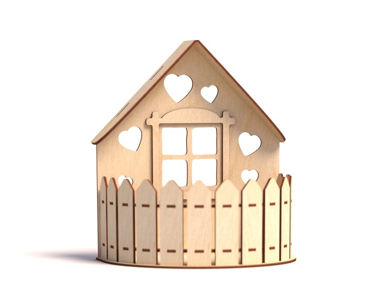 May include: A wooden house with a fence and heart cutouts. The house has a window with four panes. The house is light brown and the fence is a darker brown.