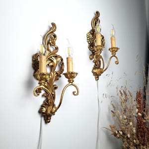 Set of 2 baroque rococò wooden florentine wall sconces with golden finish: 2 arms candle