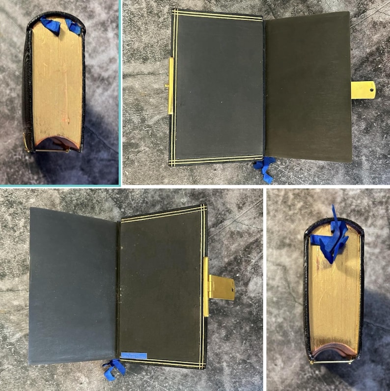 May include: A black journal with gold-edged pages and a gold clasp. The cover has a gold border. A blue ribbon bookmark is attached. The journal is shown closed, open, and from the side.
