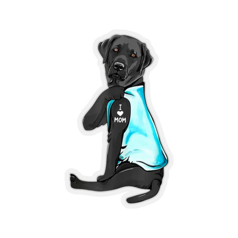 May include: Black Labrador Retriever wearing a blue shirt with a white heart and the text "I love Mom" on the left shoulder.