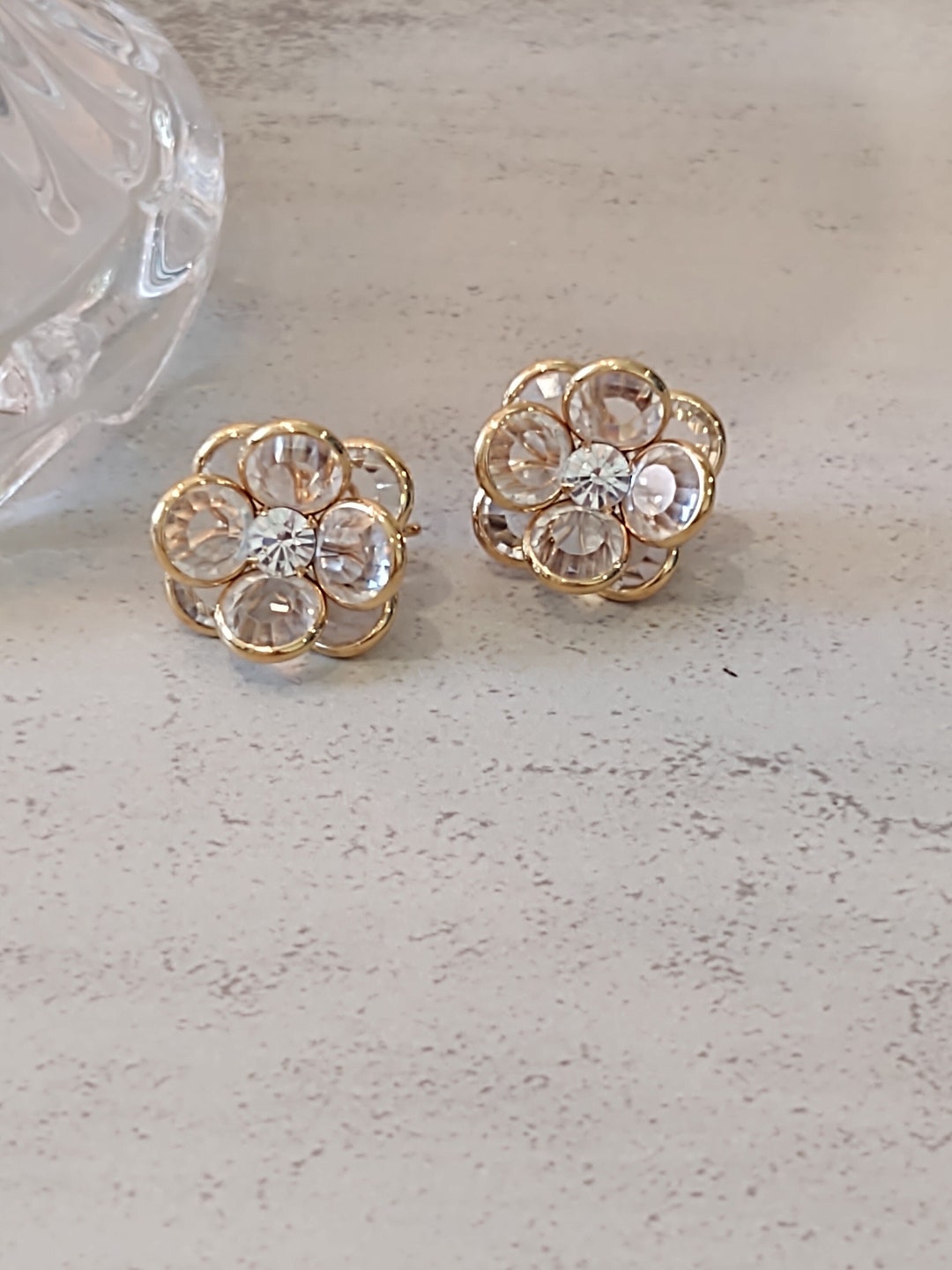 Vintage Swarovski Earrings Clear Bezel Crystal Gold Tone Clip on Flower