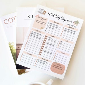 May include: A printable work day organiser with sections for priorities, deadlines, schedule, calls, emails, meetings, reminders, and notes. The organiser is designed with a light pink and brown colour scheme.