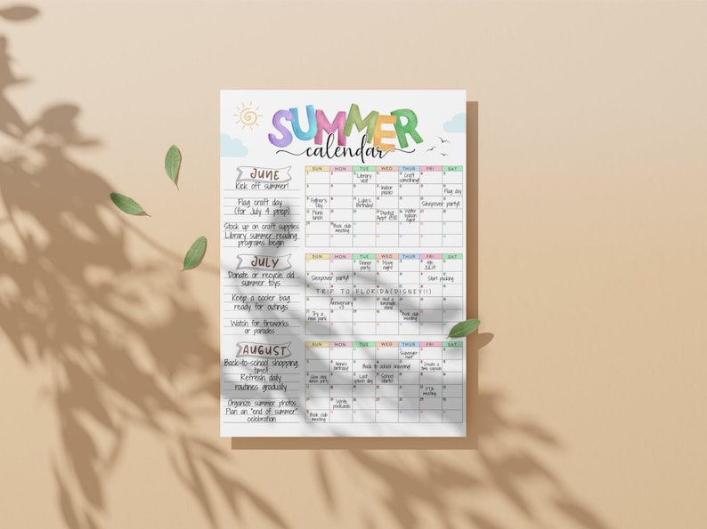 May include: A colorful summer calendar with the word "SUMMER" in rainbow lettering. The calendar includes dates for June, July, and August, with various activities listed such as "Flag craft day" and "Trip to Florida".