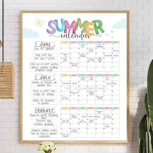 May include: A framed summer calendar with a wooden frame. The calendar is filled with colorful text and illustrations, including the word "SUMMER" in large, multi-colored letters. The calendar includes dates for June, July, and August, with various summer activities.