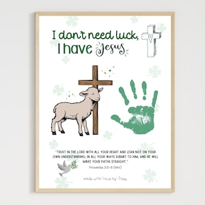 May include: A printable wall art design with a green handprint, a cross, a lamb, and a quote about trusting in the Lord. The text reads "I don't need luck, I have Jesus." and "Trust in the Lord with all your heart and lean not on your own understanding; in all your ways submit to him, and he will make your paths straight." Proverbs 3:5-6 (NIV). The design also includes the text "made with love by Joey".