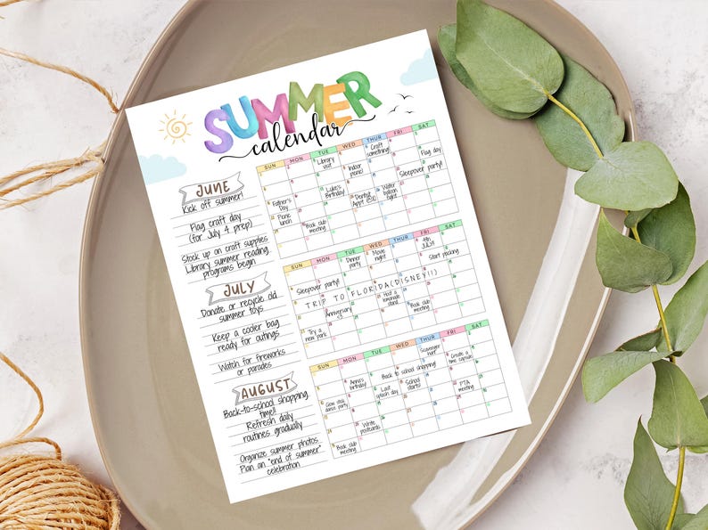 May include: A colorful summer calendar with the word "SUMMER" in large, playful letters. The calendar includes dates for June, July, and August, with summer-themed activities like "Flag craft day" and "Back-to-school shopping".
