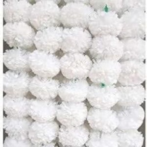 May include: A garland of white artificial flowers, resembling marigolds, strung together. The garland is made of soft, fluffy fabric and is perfect for decorating for a wedding or other special occasion.