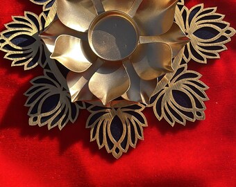 Lotus Rangoli base with golden metal T Light holder