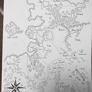 May include: Hand-drawn fantasy map with intricate details. Features include mountain ranges, forests, rivers, and labeled locations such as "Eylabur" and "Holy Hills." A compass rose is in the lower left corner. The map is on a white background.