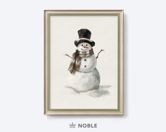 May include: Watercolor painting of a snowman wearing a black top hat, a scarf with brown and white stripes, and twig arms. The snowman has three black button eyes and a carrot nose. The artwork is framed in a light beige frame.
