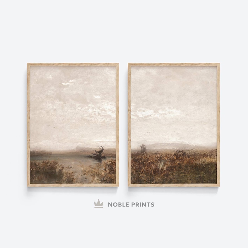 May include: Two framed landscape paintings with a muted color palette. The paintings depict a misty, tranquil scene with a lake, trees, and grasses in shades of brown, beige, and gray.