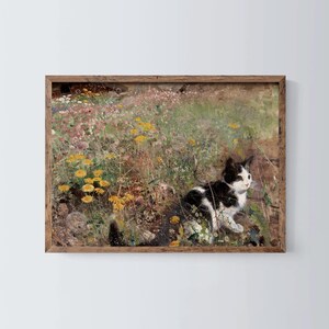 May include: A black and white cat sits in a field of yellow and pink flowers. The cat is looking to the right of the image. The background is a blurred field of green and brown.