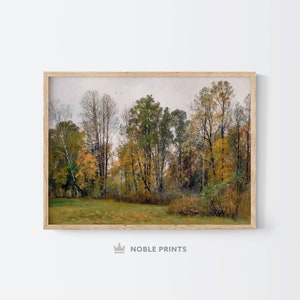 Op de afbeelding: Een ingelijste print van een schilderij dat een bos sc&egrave;ne toont met bomen in verschillende tinten groen, geel en bruin. De bomen zijn in een lijn over het midden van de afbeelding geplaatst, met een grasveld op de voorgrond.