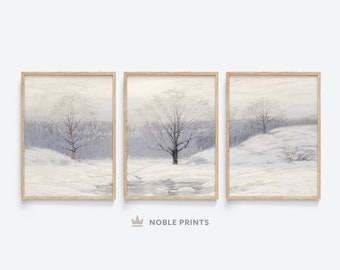 May include: A set of three framed prints depicting a winter landscape with bare trees and a snowy field. The prints are in a light wood frame and have a muted color palette.