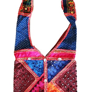 Bag embroidered with sequins and small shells