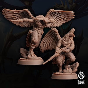 May include: Two detailed miniature figures of humanoid creatures with bird-like features and wings. Both figures are holding weapons and are posed in a dynamic stance. The figures are painted in a brown color and are set on circular bases.