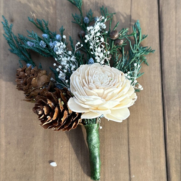 Evergreen and ivory boutonnieres with fresh Juniper, Juniper berries & sola wood flowers for Winter Wedding/woodland wedding, special event