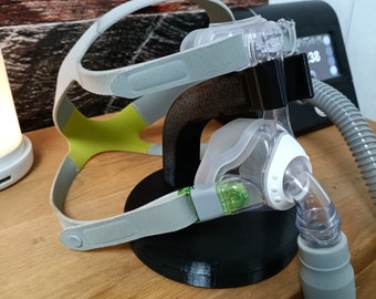 Sleep apnea CPAP mask holder - different designs and colors