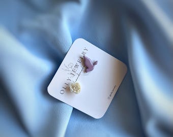 Very delicate and cute earrings made of polymer clay with epoxy resin elements.
