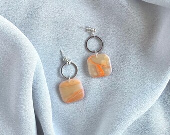 Emilia’s Earrings. The amber effect, beautiful, bright. Is suitable for every day and special occasions. Size: 37 mm.